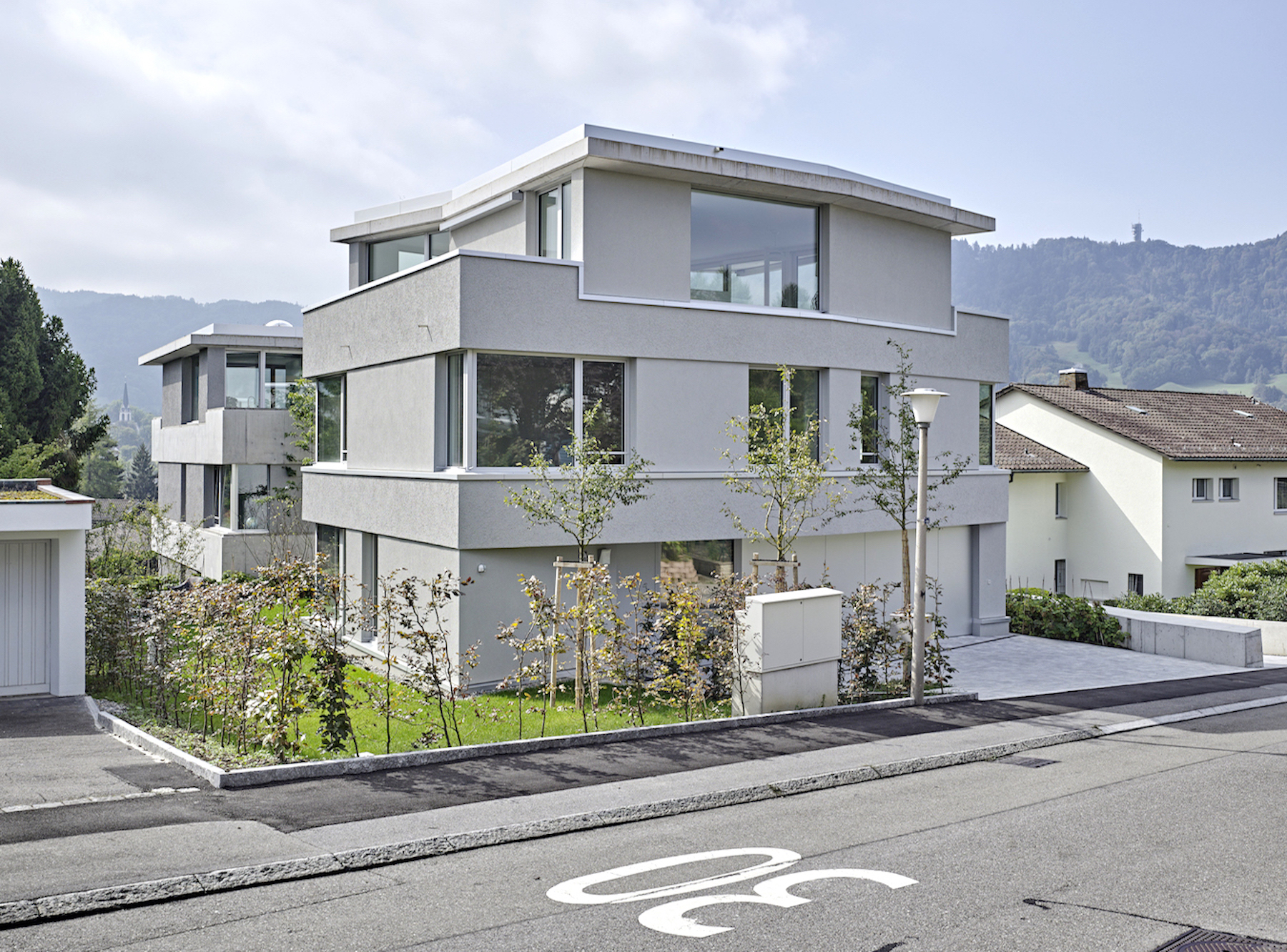 neubau einfamilienhäuser adliswil Spoerri Thommen Architekten